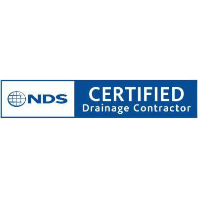 A blue and white logo featuring "NDS" with a globe icon, and text reading "Certified Drainage Contractor" in bold letters.